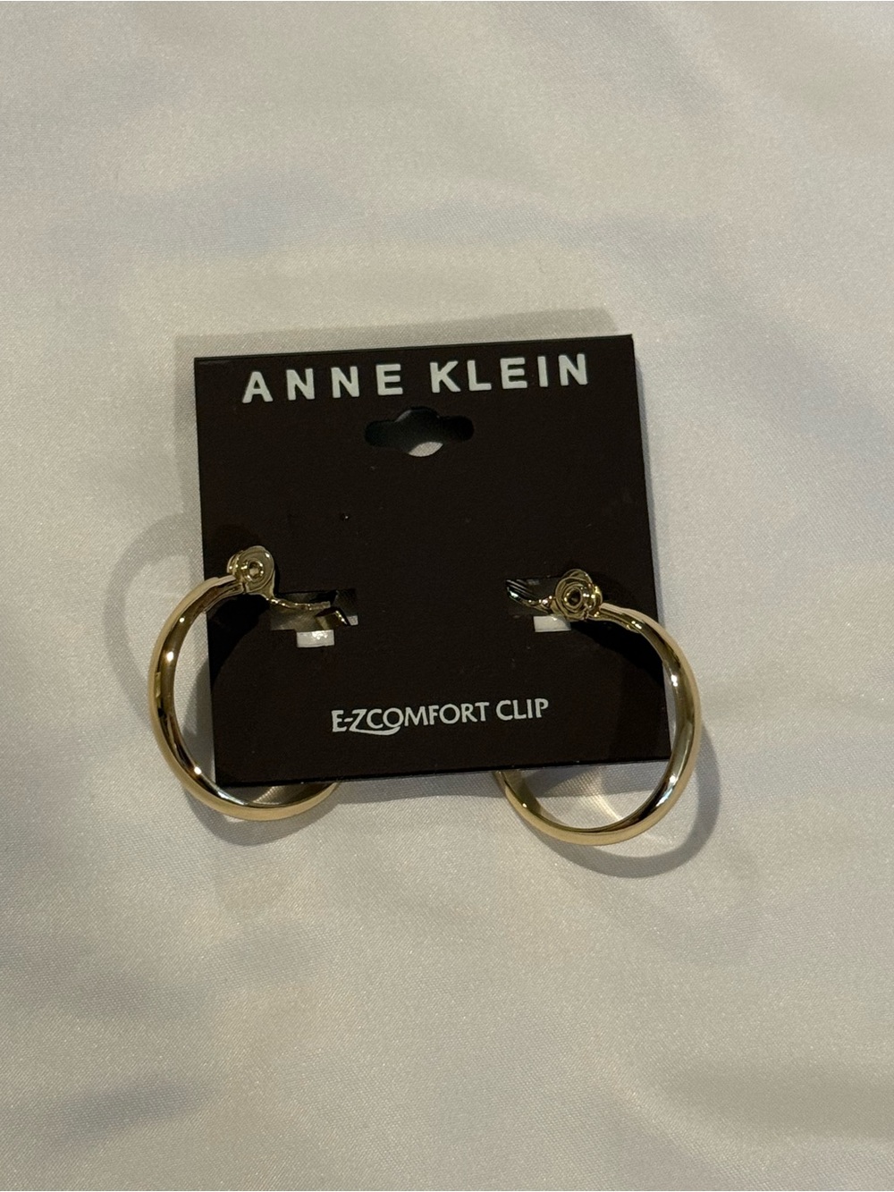 Anne Klein Polished Gold Twist Hoop Clip-On Earrings